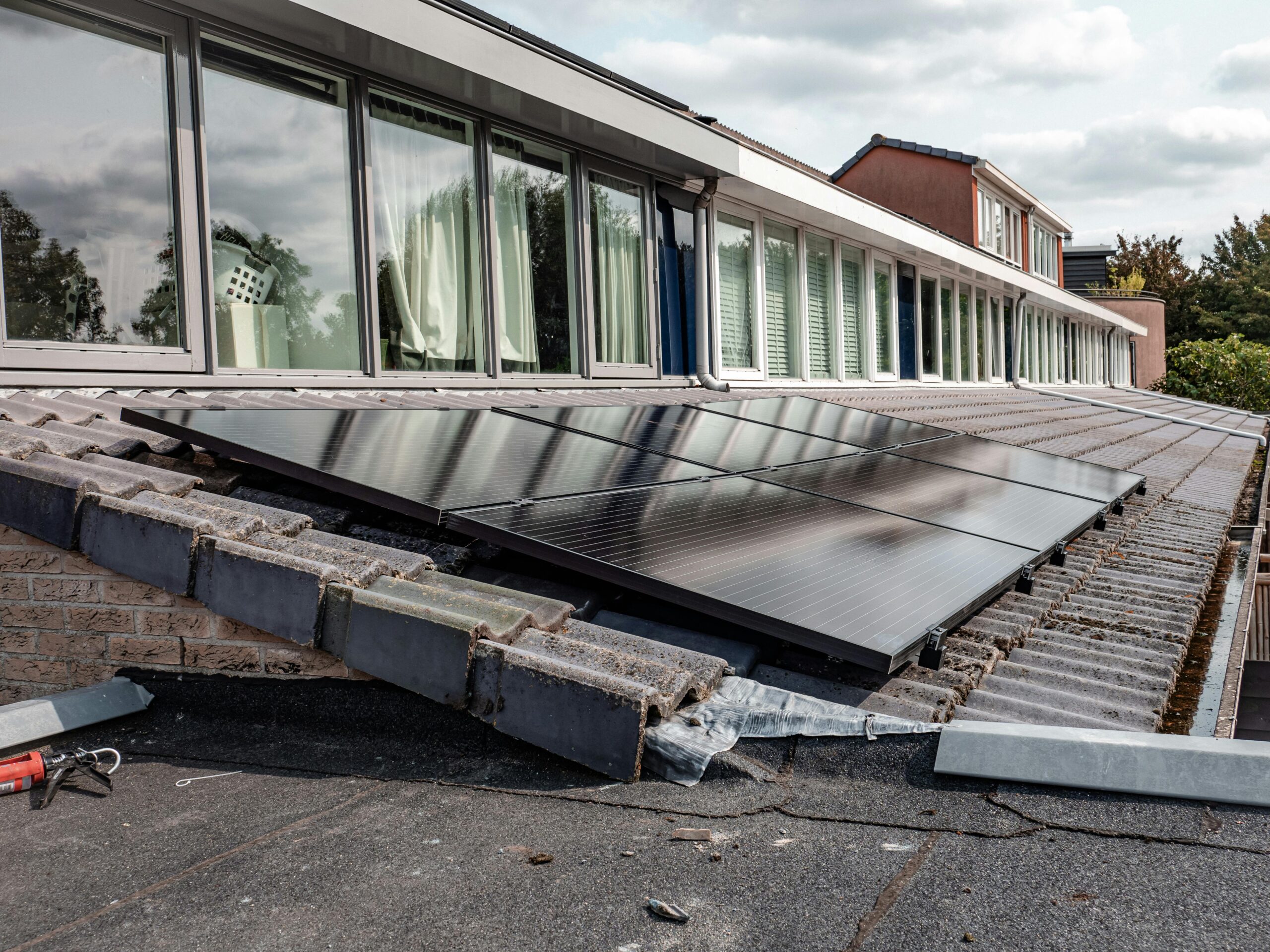 How are solar panels mounted on a roof