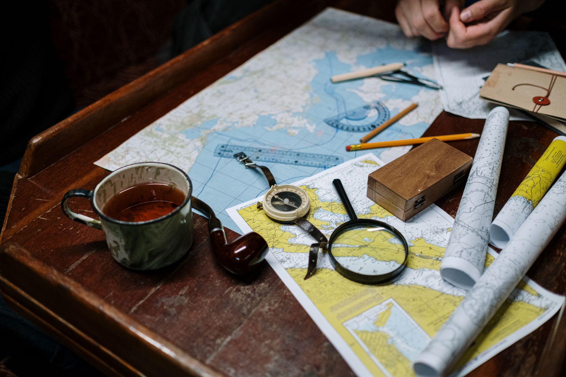 UTC ve GMT aynı mı - close up of clock face showing time zones on a desk with map photorealistic natural light photo